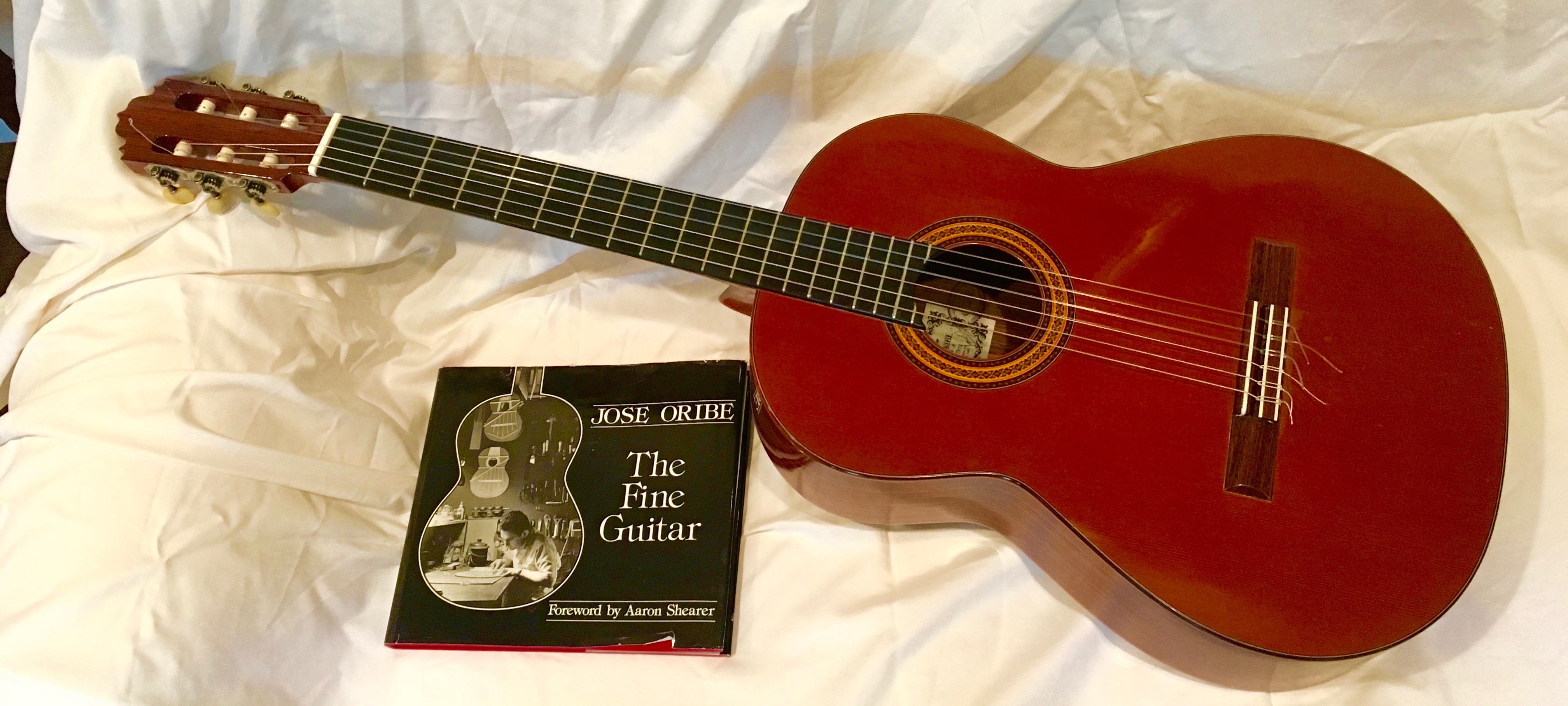 *Oribe guitar, case and book (1)